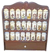 Complete vintage MJ Hummel porcelain spice jar set with a wooden rack (24 jars)