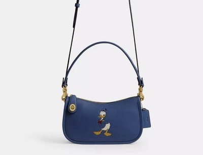 COACH コーチ　【DISNEY X COACH 】 トート　ドナルドダック Disney x Coach collabo Swinger Bag / Donald Duck CDN03 B4PF7 Stone