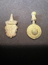 Two bronze Roman pendants