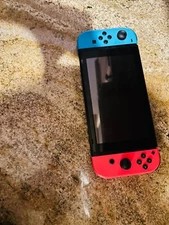 Nintendo Switch 32GB Handheld Console - Neon Red/Neon Blue - Great Condition