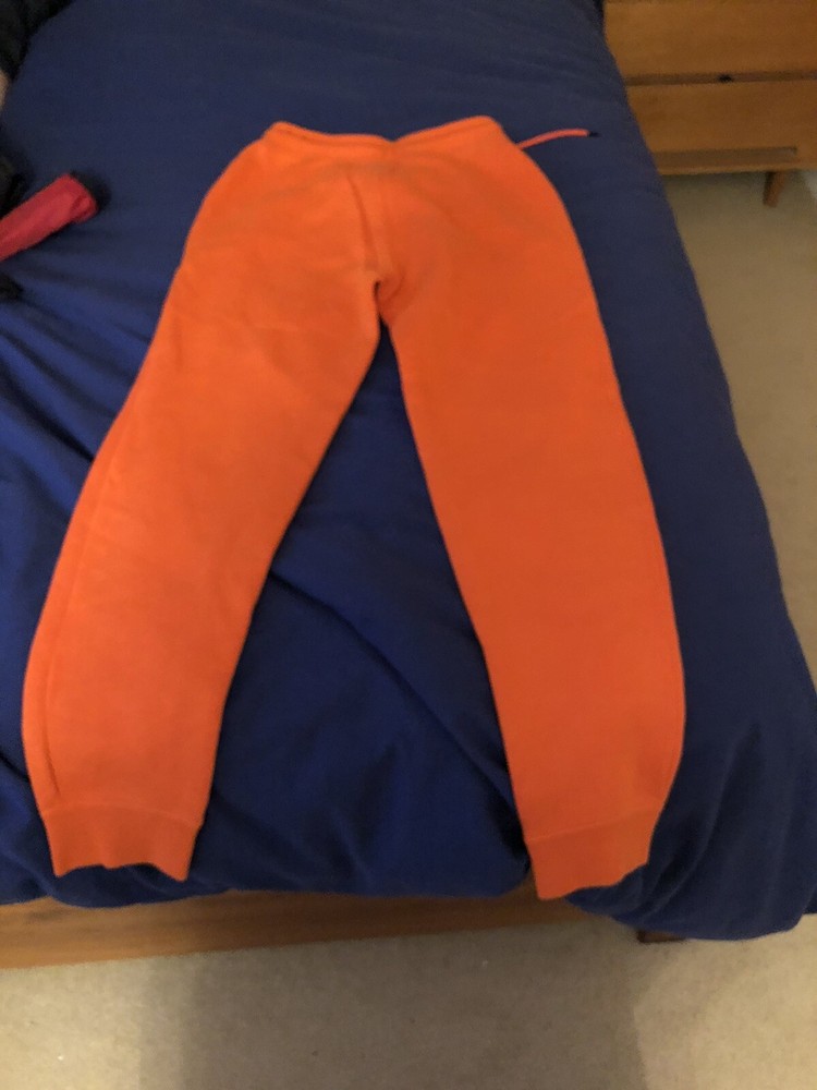 womens nike orange tracksuit