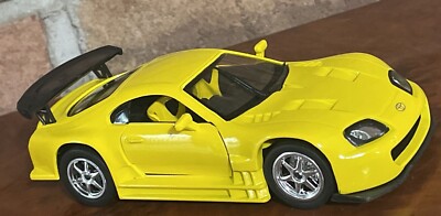 TOYOTA SUPRA YELLOW SAICO BRAND NEW 1:32 SCALE 