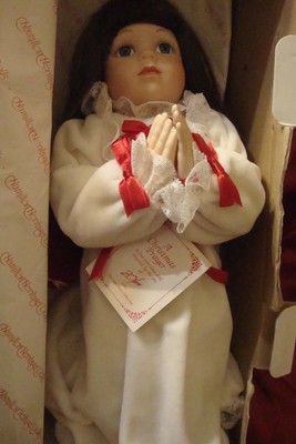 a christmas prayer porcelain doll