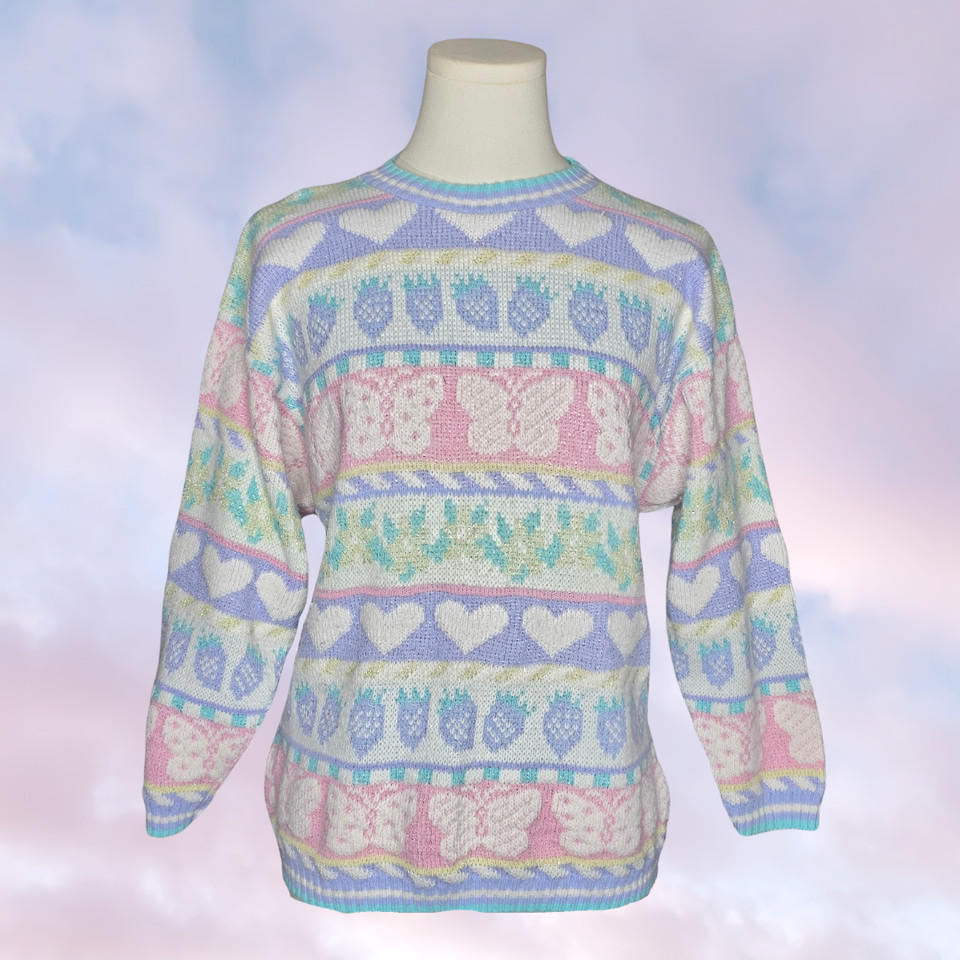 A USA-made vintage sweater with pastel hearts, rabbits, florals, AND metallic lurex — an utterly specific piece of wearable nostalgia that practically gift-wraps itself.