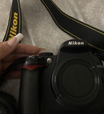 Nikon D D5000 12.3MP Digital SLR Camera - Black (Body+Lens+Starter Accessories