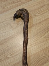 Antique brown cane walking stick, 33 inches tall.