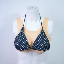 This realistic and soft silicone breast implant features a hollow back design.
