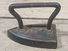 antique miniature cast iron "sad iron" has number 1 on it I believe