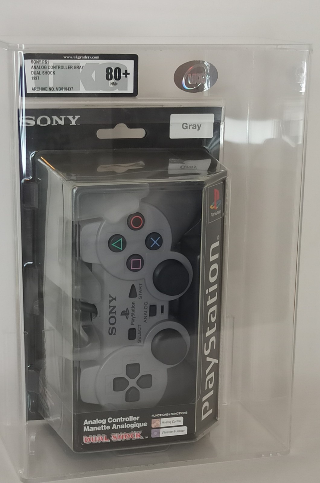 Manette PlayStation 1 Dualshock grise neuve avec sticks analogiques
