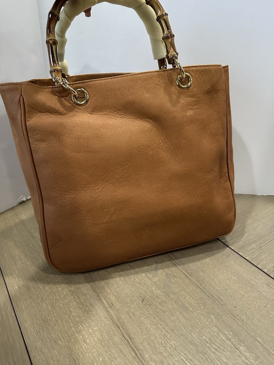 Bamboo handle drape bag／orange camel
