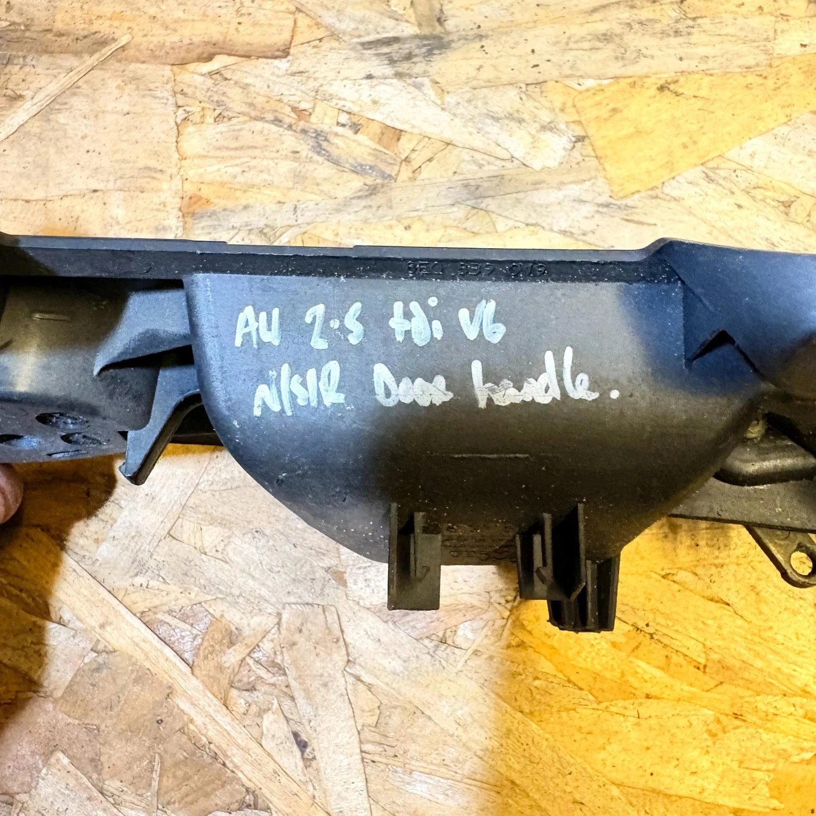 Actual Audi rear left door handle reverse with donor marking