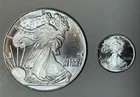 Lot of (2) .999 Silver Walking Liberty Rounds (1) 1 Troy oz & (1) 1/10 troy oz