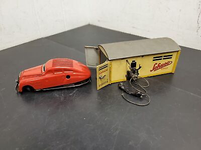 Vtg Schuco Kommando Anno 2000 Wind up car and Schuco Garage No