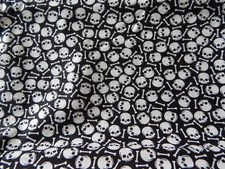 BTY A/O "SMALL SKULLS BONES " ON BLACK PRINT COTTON FABRIC