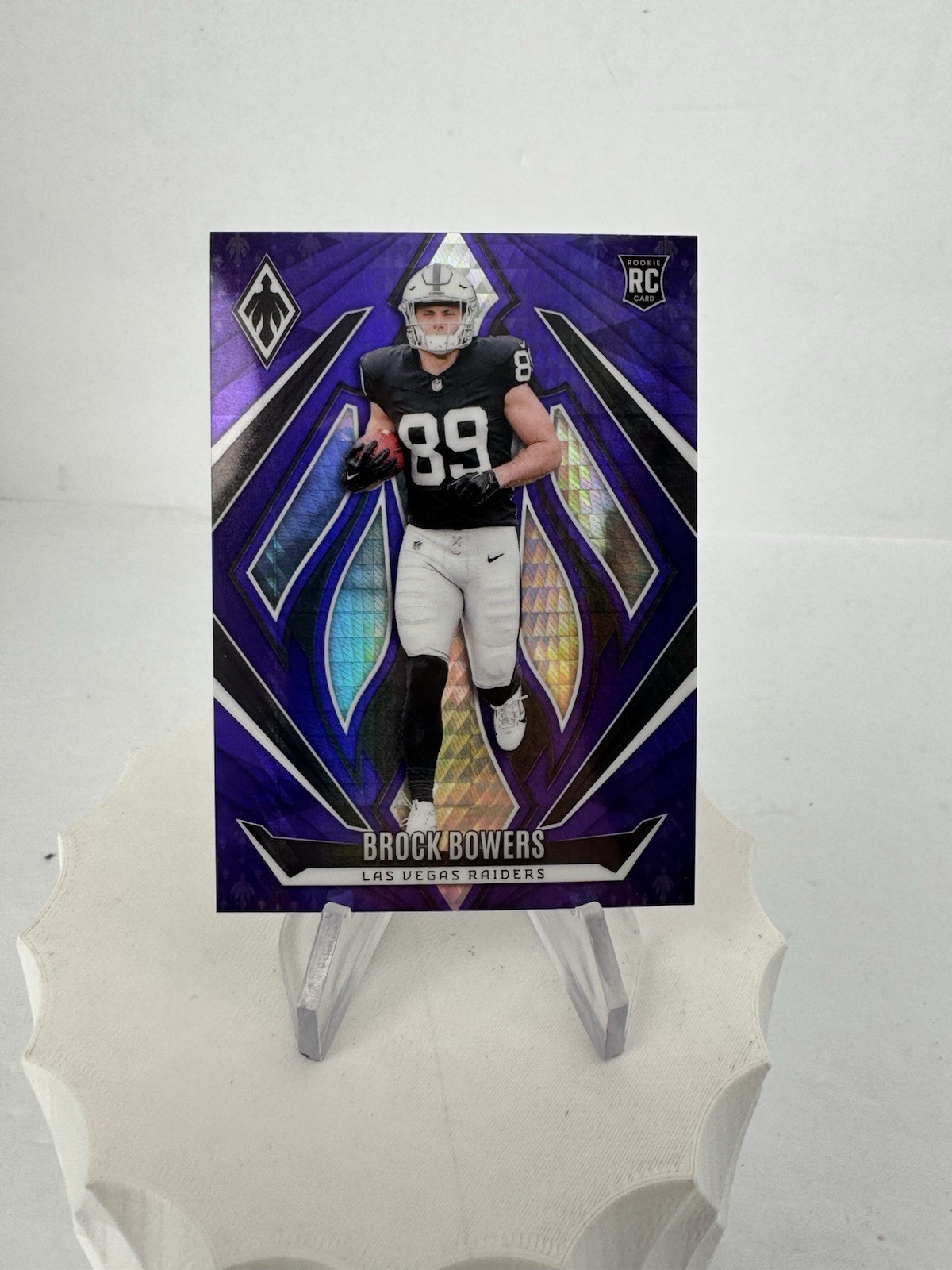 2024 Panini Phoenix Rookies Brock Bowers #165 Purple Hyper (RC)