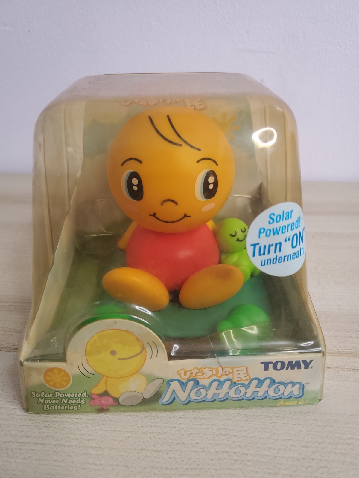 Tomy Nohohon Sunshine Buddy/ Baby Solar Powered Bobble Head Happy Face