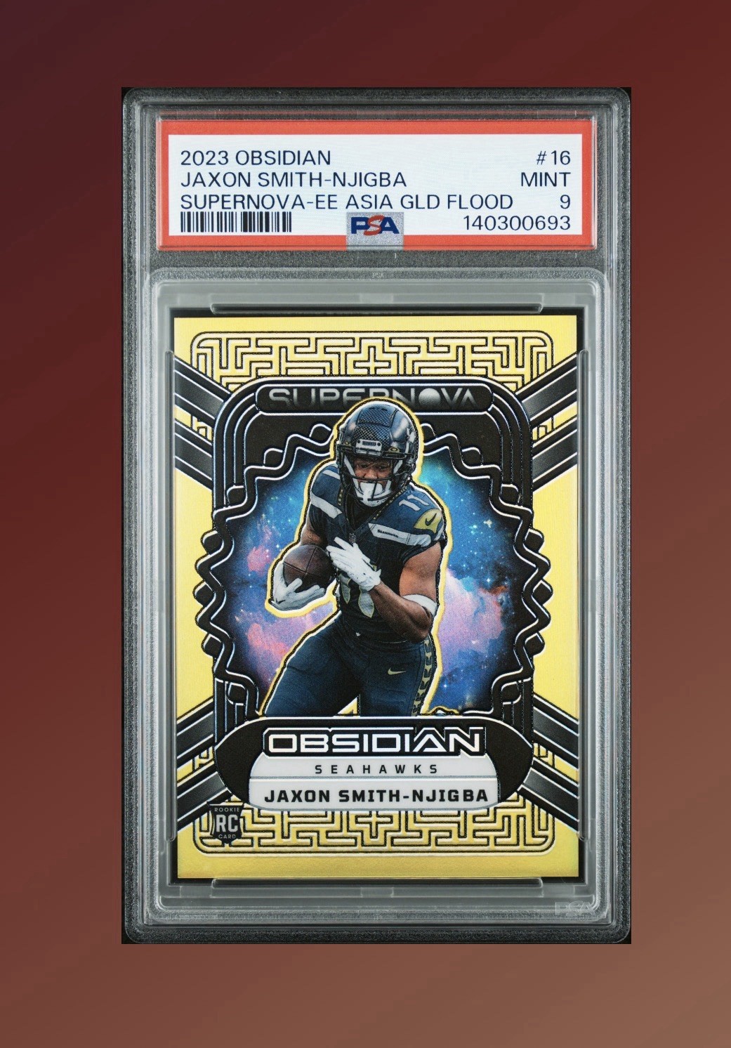Jaxon Smith-Njigba Panini Obsidian Supernova #16 Electric Etch Asia Gold Flood