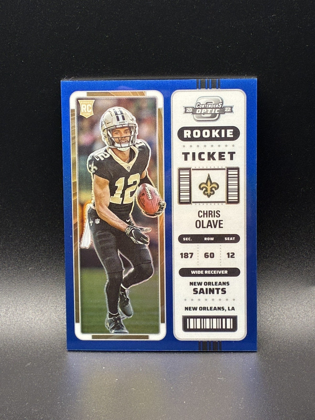 Chris Olave 2022 Panini Contenders Optic Rookie Ticket Blue Prizm /99 #65 Saints