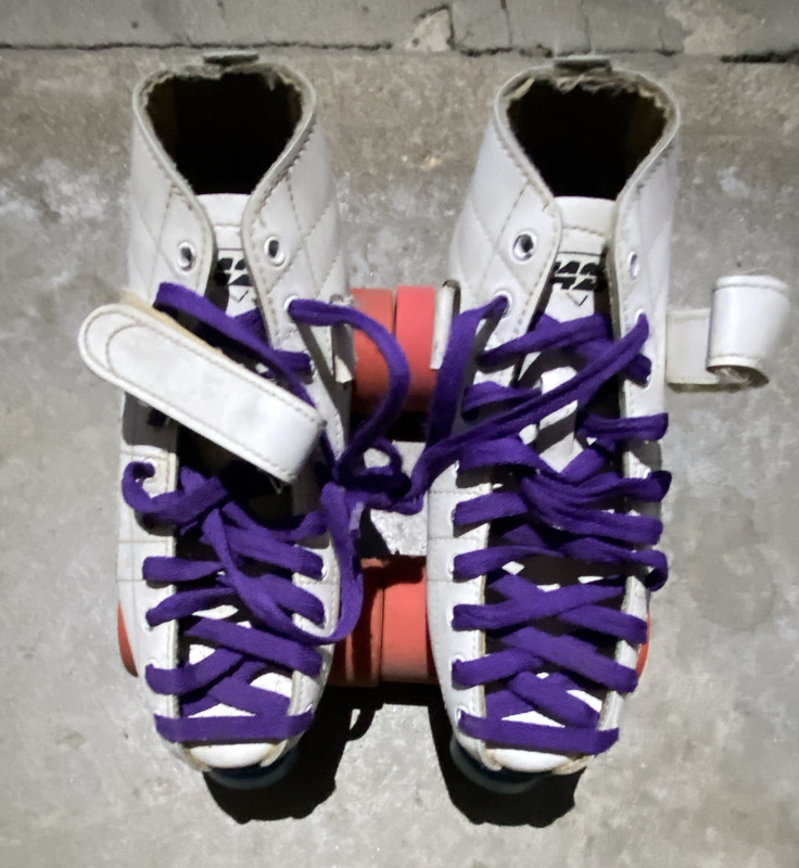 Hard Candy White Quad Roller Skates, Purple Laces, Orange Wheels, Blue Toe Stops