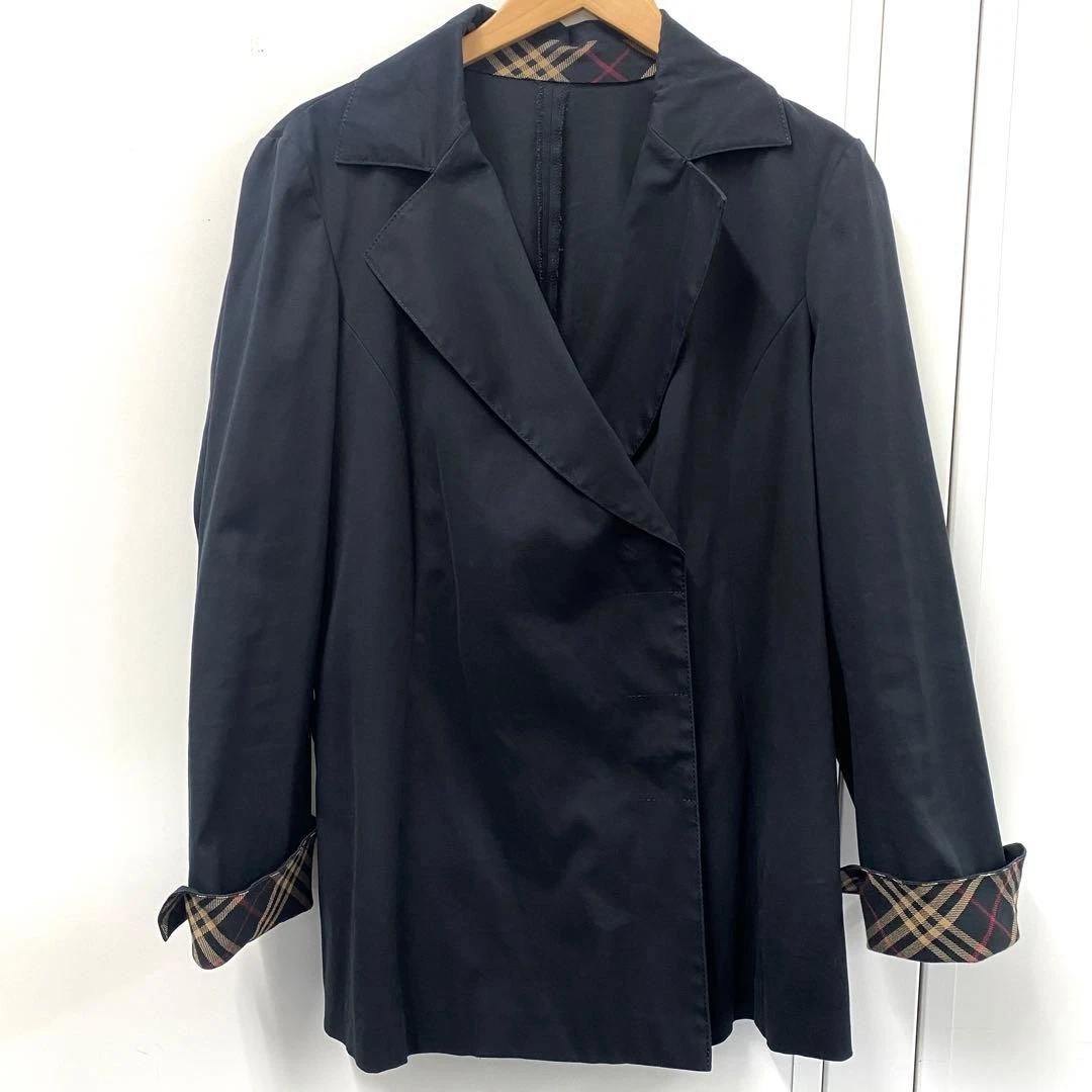 Chaqueta de trinchera BURBERRY BLUE LABEL negra puños a cuadros Nova elásticos JP 38 US S