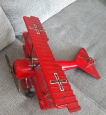 Red Baron Tri-Plane Model Airplane WWI Propeller Tin Metal Vintage in nice shape