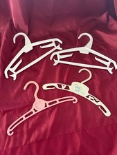VINTAGE BABY CLOTHES HANGERS, plastic, 4