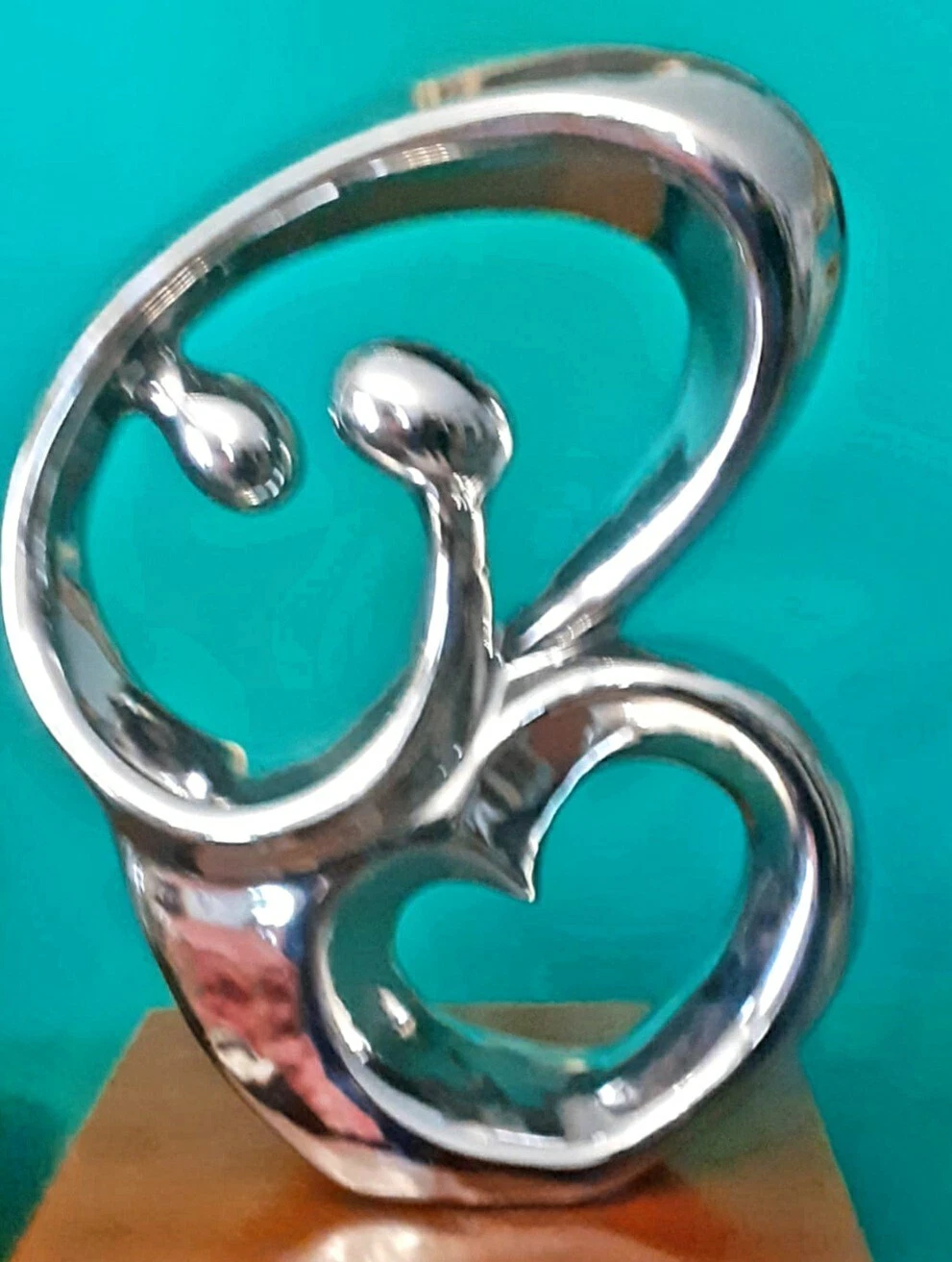 Gorgeous Modern Sculpture Silver Color Family Stylized