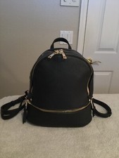 Black Travel Backpack. Small/Medium. 10.5  x11  x5.5  . Adjustable Straps. NEW.