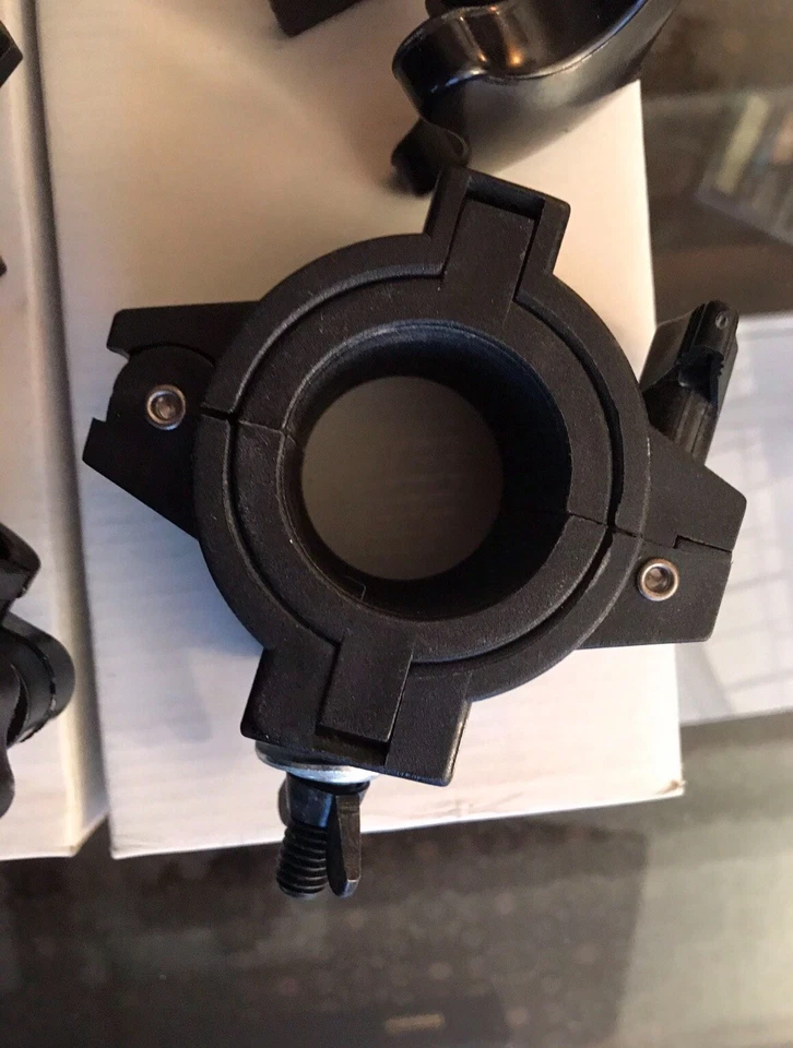 abrazaderas de armadura de iluminación Foto 3 de 4