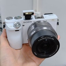 Sony Alpha a6000 24.3MP Mirrorless Digital Camera w/16-50mm OSS Lens -White
