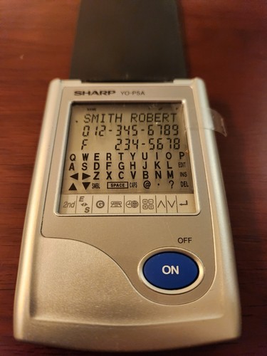 Sharp Personal Organizer PDA Touch Screen Translator Games 48KB YO-P5A Vintage - Photo 2 sur 6