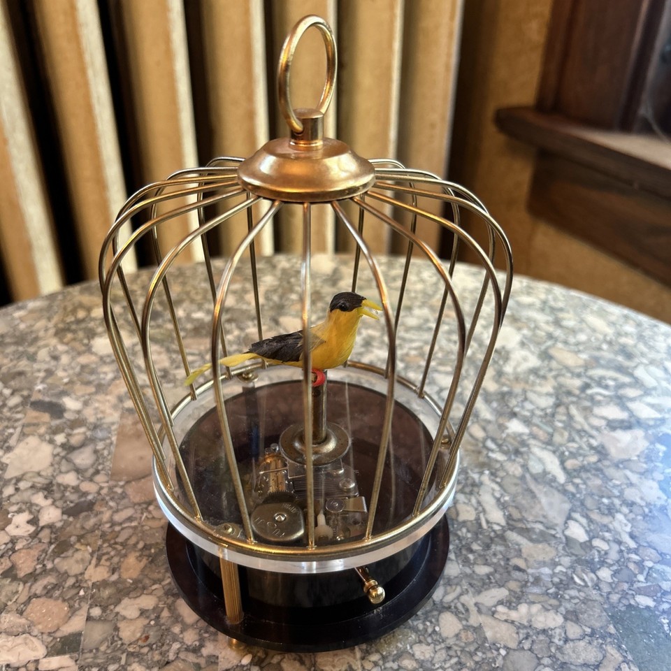 A Waco birdcage music box — animated mechanical birds in a ornate cage that plays music is pure Victorian-era whimsy at its finest.