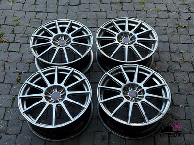 A set of 12 spoke 18 inch Enkei STI rims from Subaru Legacy BL/BP Tuned by STi