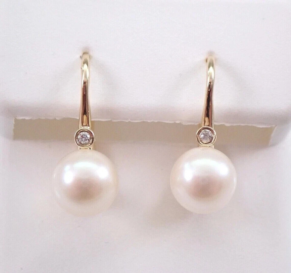 Pendientes colgantes/gotas de perlas blancas de corte redondo de 3,00 quilates enchapados en oro amarillo de 14 quilates Foto 3 de 4