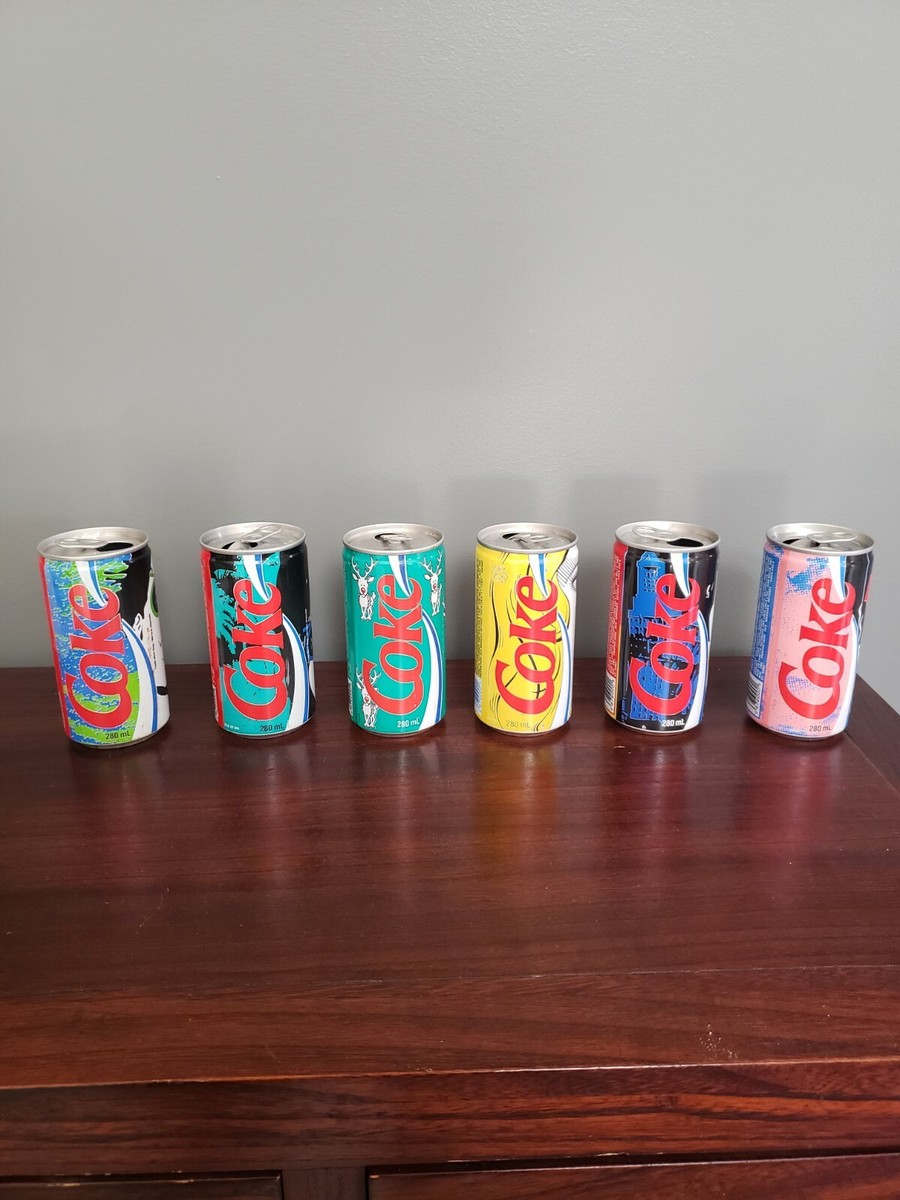 Lot of 6 vintage Coca Cola cans from the late 1980s and early