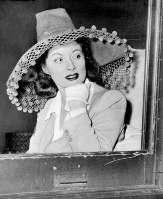 Underneath the spreading sombrero is the expressive face of Greer  .. Old Photo