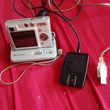 Casio Exilim EX-Z30. Tested with dock usb and power cable (USA needs adapter)