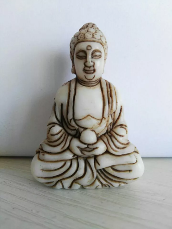 Ivory hotsell buddha pendant
