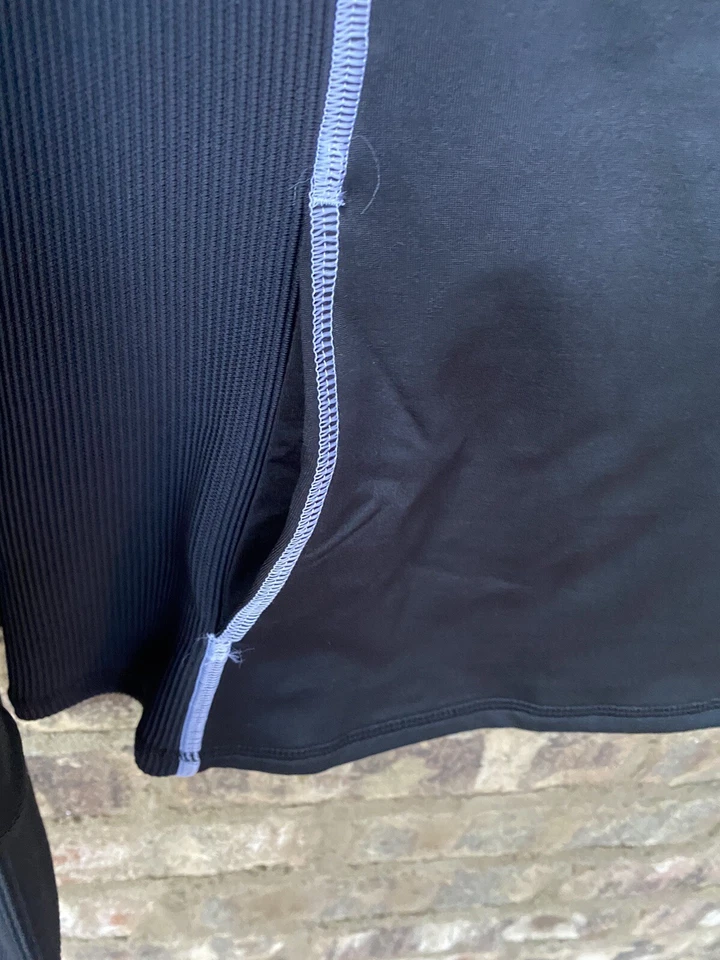 Sudadera para mujer Under Armour Train clima frío 1/2 cremallera, negra/blanca, pequeña Foto 2 de 4