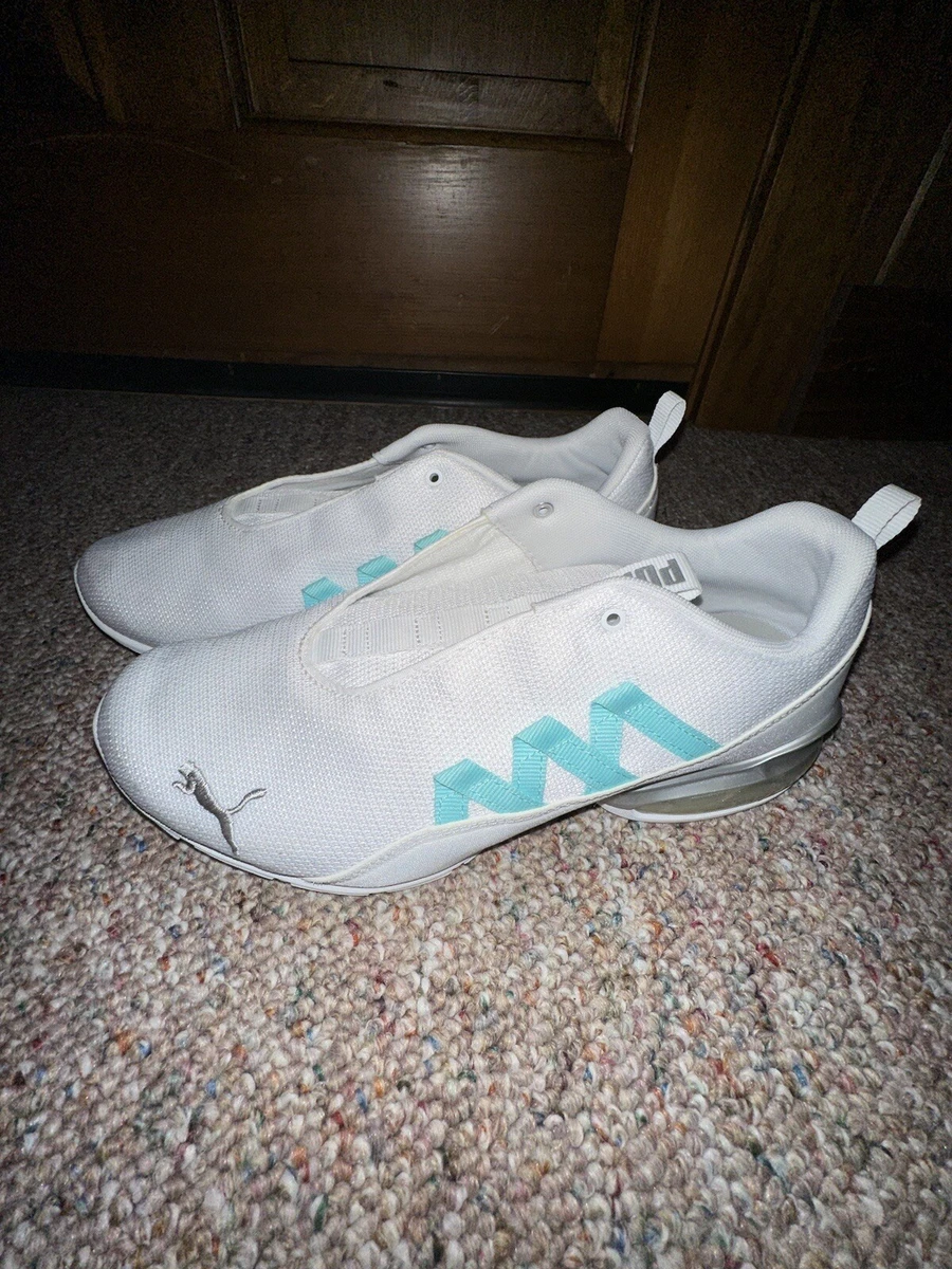 PUMA Women s Riaze Prowl Sneaker White And Teal Tennis Shoe Blue