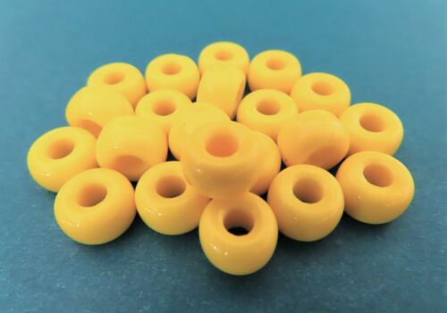12 5 x 9 mm Czech Glass Crow Beads: Opaque Yellow - Picture 1 of 1