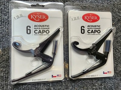 Two Kyser acoustic guitar capos