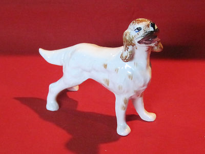 Vintage porcelain Brittany or Springer Spaniel hunting dog figurine