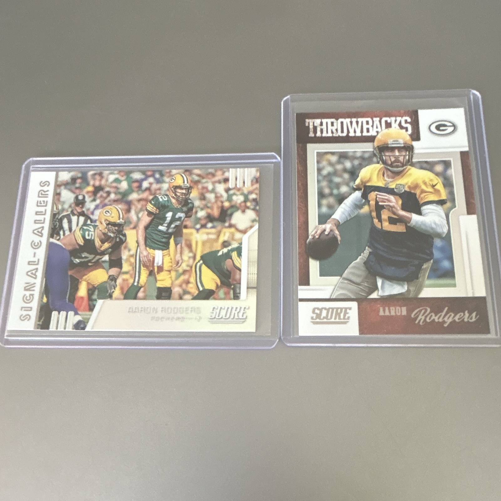 2 2019 Score Aaron Rodgers inserts: #SC-15 Signal Callers & #T-3 Throwbacks