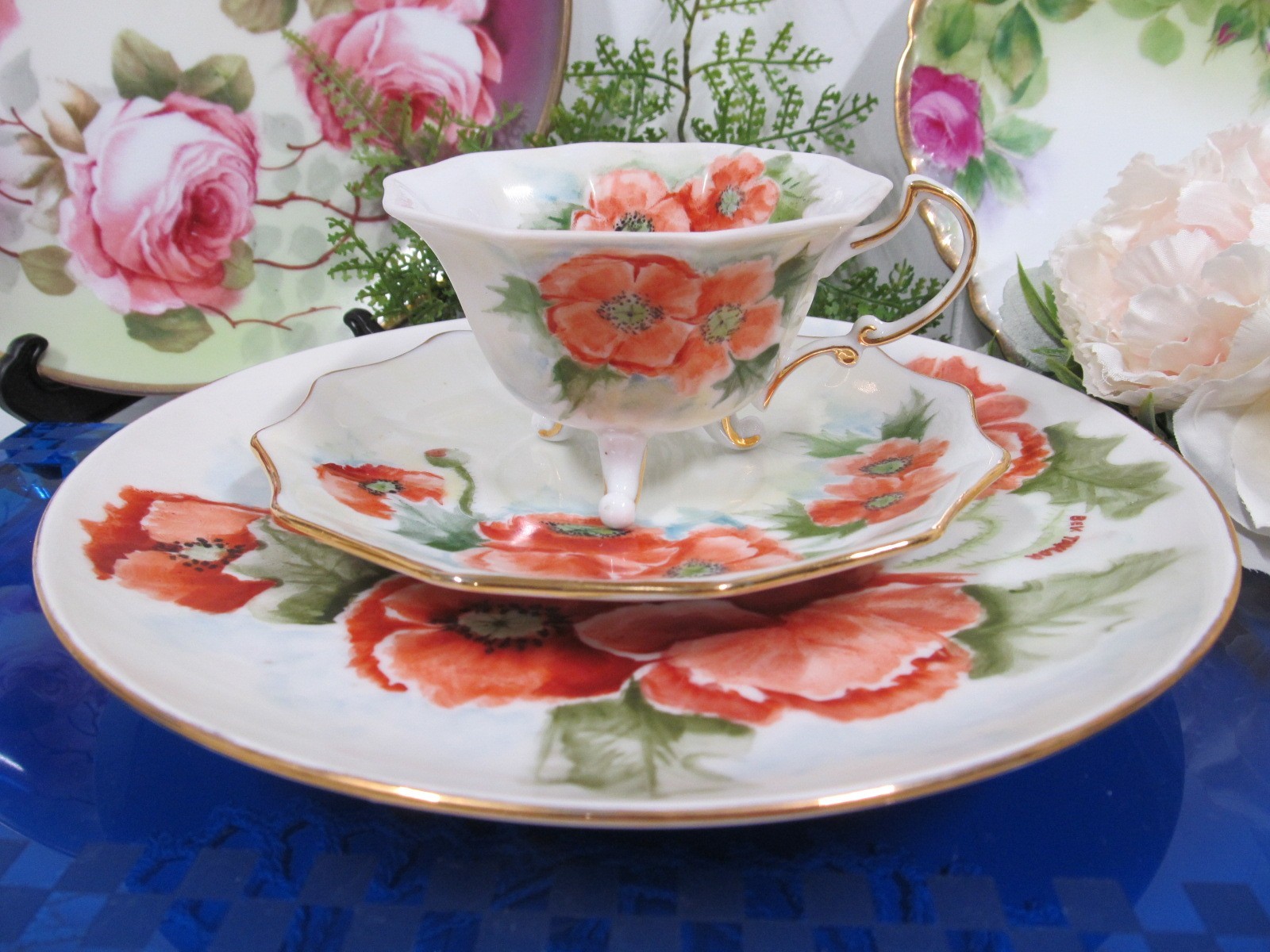 Germany tea cup and saucer trio ORANGE POPPY  artist signed footed teacup