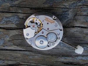 MOVEMENT TISSOT NEW LOST HOUR WHEEL FOR PARTS OR REPAIR