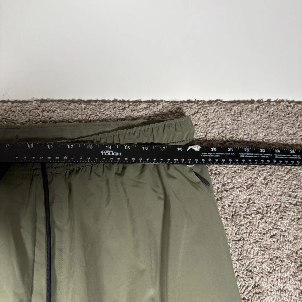 Nike Unlimited Para Hombres Dri-FIT Puño con Cremallera Joggers Verde Talla 2XL FB7546-222 Foto 3 de 4