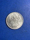1884-O Morgan Silver Dollar nice AU