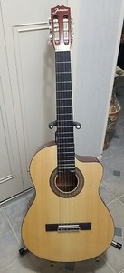 Jasmine JC25CE-NAT Classical-Electric Cutaway Nylon string Guitar w/tuner.