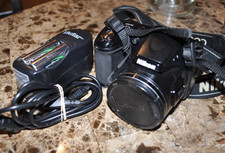 Nikon L820 Coolpix, Plus 2 sets of rechargeable batteries, Strap, Cord, SD Card